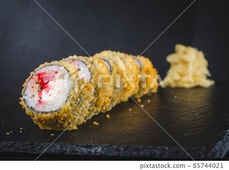 Fried roll in deep fat. Japanese food 85744021