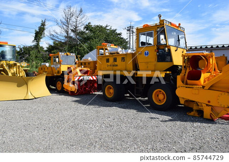 Snowplow waiting in a snowy country Snowplow waiting in a snowy country 85744729