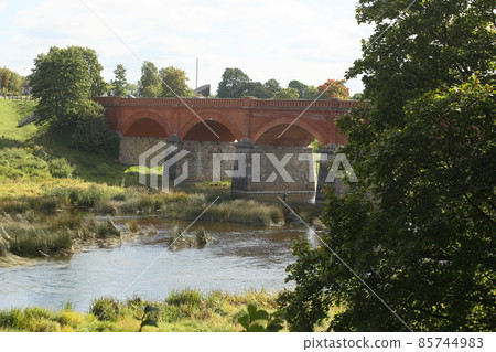 Old bridge on the Venta River, Kuldiga, Latvia. High quality photo 85744983