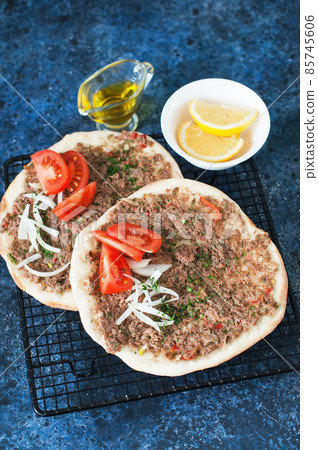 Lahmacun Turkish traditional cuisine, flatbread with minced meat and spices. Lahmacun Turkish traditional cuisine, flatbread with minced meat and spices. 85745606