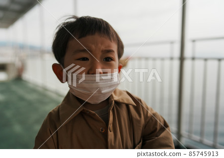 An unpleasant boy portrait 85745913