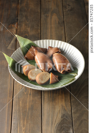 Fresh squid rice of local cuisine on bamboo leaves 85747285