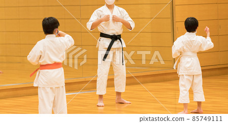 Children practicing karate at the dojo 85749111