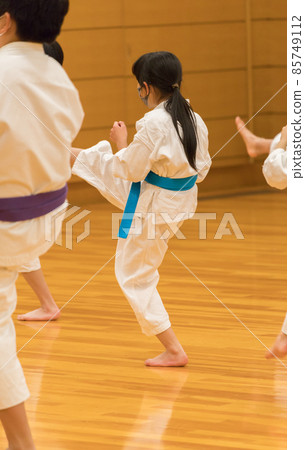 Children practicing karate at the dojo 85749112
