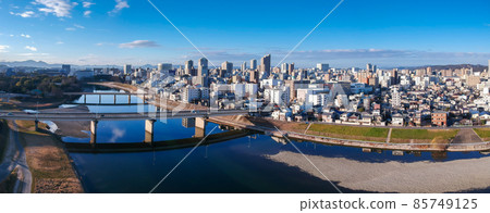 Panorama view of the cityscape of Okayama city in winter taken aerial with a drone 85749125