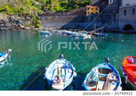 Vernazza Bay With Colorful Boats - Cinque Terre, La Spezia Province, Liguria Region, Italy Vernazza Bay With Colorful Boats - Cinque Terre, La Spezia Province, Liguria Region, Italy 85749431