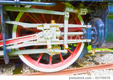 Grunge old steam locomotive wheel and rods Grunge old steam locomotive wheel and rods 85749476