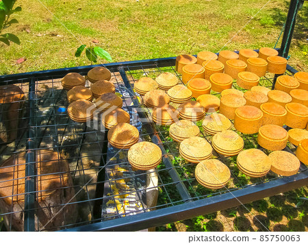 The plates made from coconut at the market in Asia 85750063