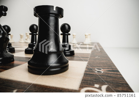 Macro photo of chess pieces on a chess board Macro photo of chess pieces on a chess board 85751161