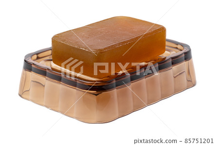 New soap on a dish isolated on white background New soap on a dish isolated on white background 85751201