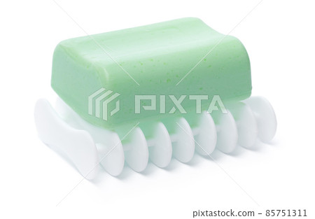 Soap on a plastic soap dish isolated on a white background Soap on a plastic soap dish isolated on a white background 85751311