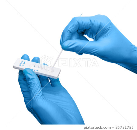 Scientist making a antigen rapid test kit for viral disease COVID-19 nCoV Laboratory card kit test for coronavirus. COVID-19 antigen rapid test 85751785