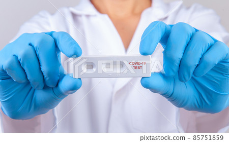 Doctor showing rapid laboratory COVID-19 antigen rapid test for diagnosis new Corona virus infection or covid-19 Pandemic infectious concept Doctor showing rapid laboratory COVID-19 antigen rapid test for diagnosis new Corona virus infection or covid-19 Pandemic infectious concept 85751859