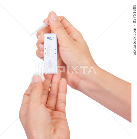 Women hands show Antigen Test kits for people to self-test for Covid-19 at home , Home isolate quarantine concept Women hands show Antigen Test kits for people to self-test for Covid-19 at home , Home isolate quarantine concept 85751889
