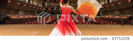 A female rehearsing a dance on the theater stage A female rehearsing a dance on the theater stage 85752836