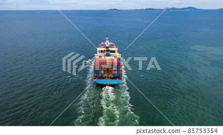 Container ship leaving the industrial seaport, Global business Import export, Company business logistic and transportation international by container cargo freight ship in the open sea. 85753354