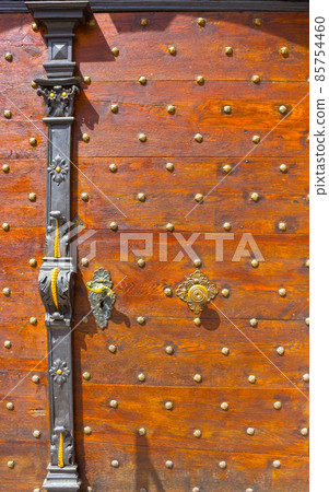 An old entrance door in Salzburg, Austria. 85754460