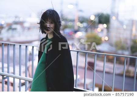 A woman wandering around the winter city A woman wandering around the winter city 85757190