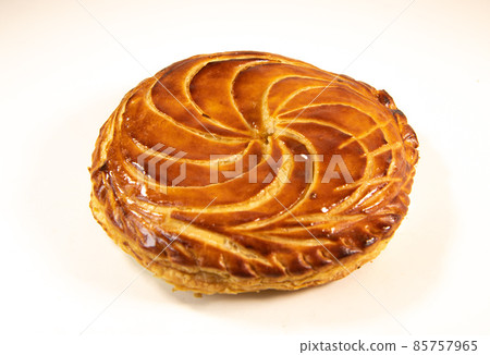 Galette des rois on wooden table, Traditional Epiphany cake in France 85757965