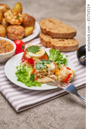 Portion of delicious chicken aspic on a plate isolated on concrete table 85758524