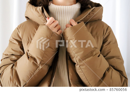 Woman wearing a down Woman wearing a down 85760056