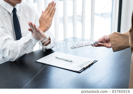 Businessman is refuses to accept banknote money and terms of contract from bribe employer in signing contract while making corruption about buy land and real estate 85760919