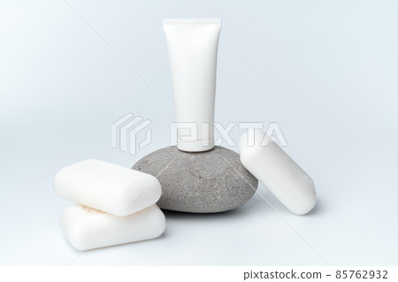 Spa stones and soap on white background 85762932