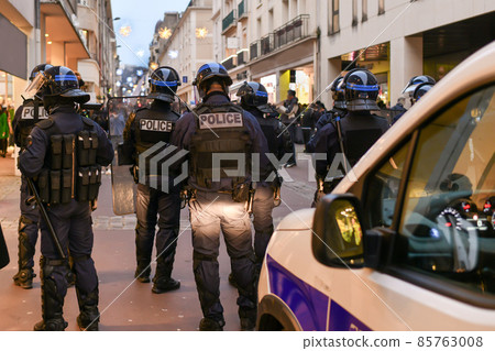 Policemen in the city on strike in a crowd of people Policemen in the city on strike in a crowd of people 85763008