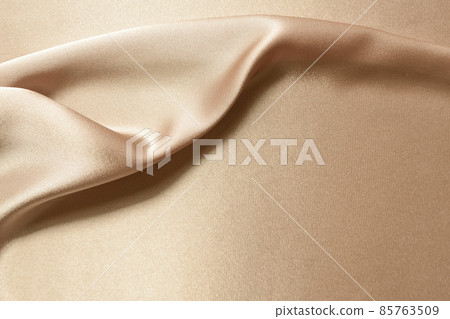 Golden silk fabric background, smooth and floating texture for design background 85763509
