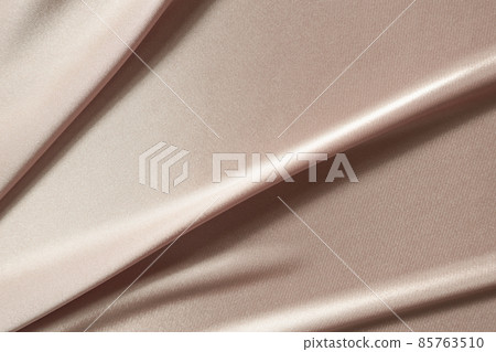rose gold silk fabric abstract background smooth and luxury texture 85763510