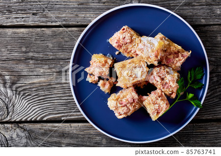 meat aspic, jellied slow cooked meat on a plate meat aspic, jellied slow cooked meat on a plate 85763741
