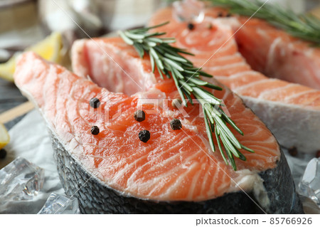Fresh raw salmon and ingredients for cooking, close up 85766926