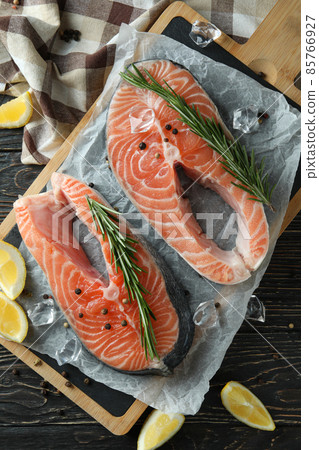Concept of cooking salmon on wooden table 85766927