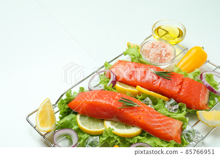 Concept of cooking salmon on white background Concept of cooking salmon on white background 85766951