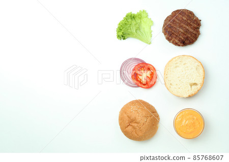 Concept of cooking burger on white background, top view Concept of cooking burger on white background, top view 85768607
