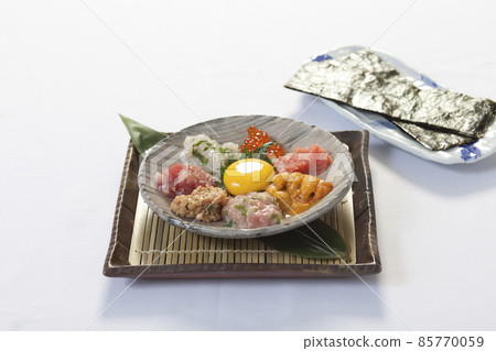 SALMON NATTO YUKKE with seaweed on white background. Japanese food. SALMON NATTO YUKKE with seaweed on white background. Japanese food. 85770059