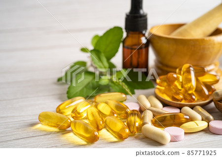 Alternative medicine herbal organic capsule drug with herbs leaf natural supplements for healthy good life. 85771925