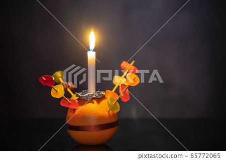 Orange Christingle is a symbolic object used in the Advent, Christmas and Epiphany services of many Christian denominations 85772065