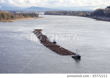 Aerial View of Tugboat in Fraser River and Mountain Landscape 85772211