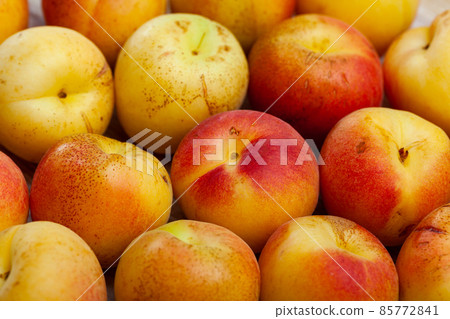 Fresh ripe apricots on wooden table 85772841