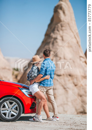 Happy couple on summer car vacation 85773779