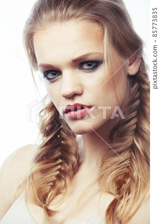 young pretty blond girl with hairstyle and make up posing happy smiling on white background isolated, lifestyle people concept young pretty blond girl with hairstyle and make up posing happy smiling on white background isolated, lifestyle people concept 85773835