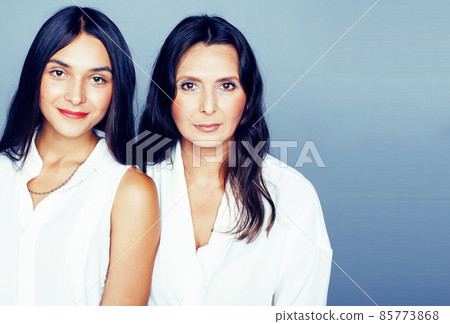 cute pretty teen daughter with mature mother hugging, fashion style brunette, lifestyle people concept cute pretty teen daughter with mature mother hugging, fashion style brunette, lifestyle people concept 85773868