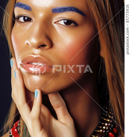 young african american woman with creative make up like ethiopian jewelry closeup dark 85773916