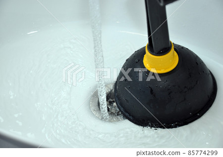 Sink plunger and plumbing problem. 85774299