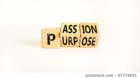 Passion or purpose symbol. Turned wooden cubes and changed the concept word 'purpose' to 'passion' on a beautiful white background. Copy space. Business and passion or purpose concept. 85774695