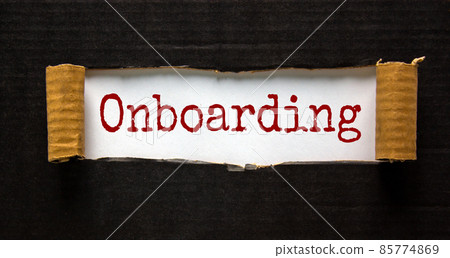 The word 'onboarding' appearing behind torn black paper. Beautiful background. Business concept. The word 'onboarding' appearing behind torn black paper. Beautiful background. Business concept. 85774869