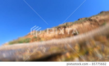 Pure and transparent water waves roll over camera. Bottom view. Pure and transparent water waves roll over camera. Bottom view. 85775682