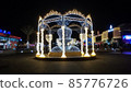 Sharm El Sheikh, Egypt - 06 Dec 2021: Colorful evening lighting of Soho square. Night festive illumination of New Year holiday. 85776726