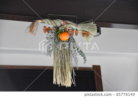 New Year's decoration at the front door of Nara with dried persimmons 85778149